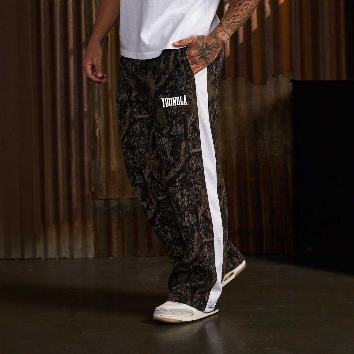 Nuovi pantaloni sportivi da uomo in stile americano con stampe patchwork pantaloni lunghi casual per jogging sport fitness e basket T260924