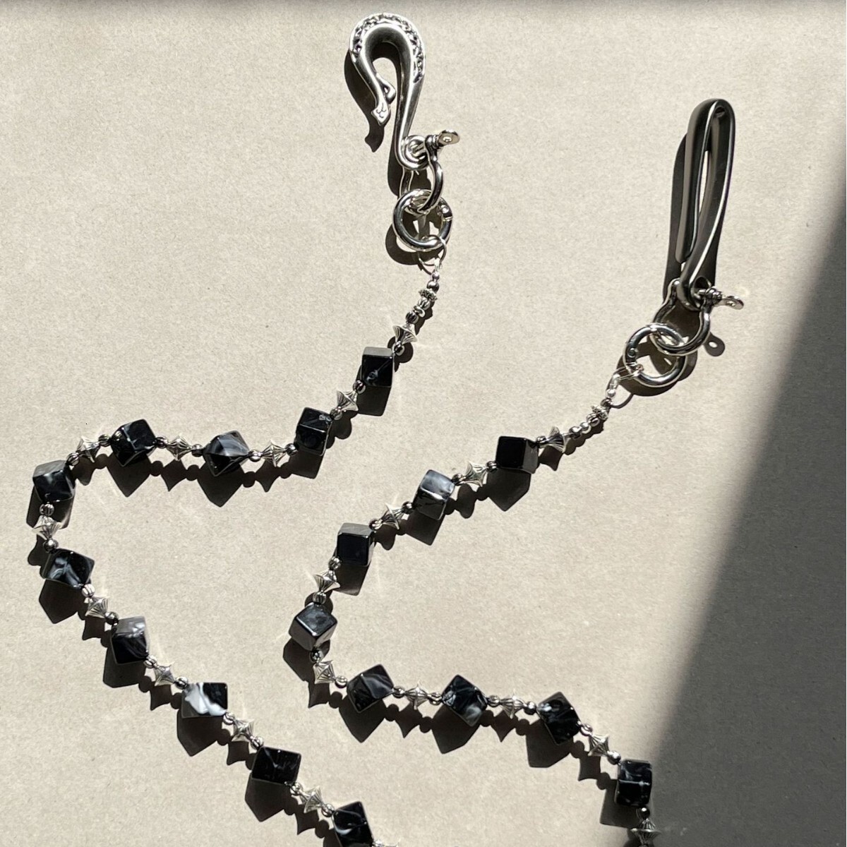 ink-wash, dark-toned, handcrafted design belt chain, niche high-end item for sales, with a European and American style