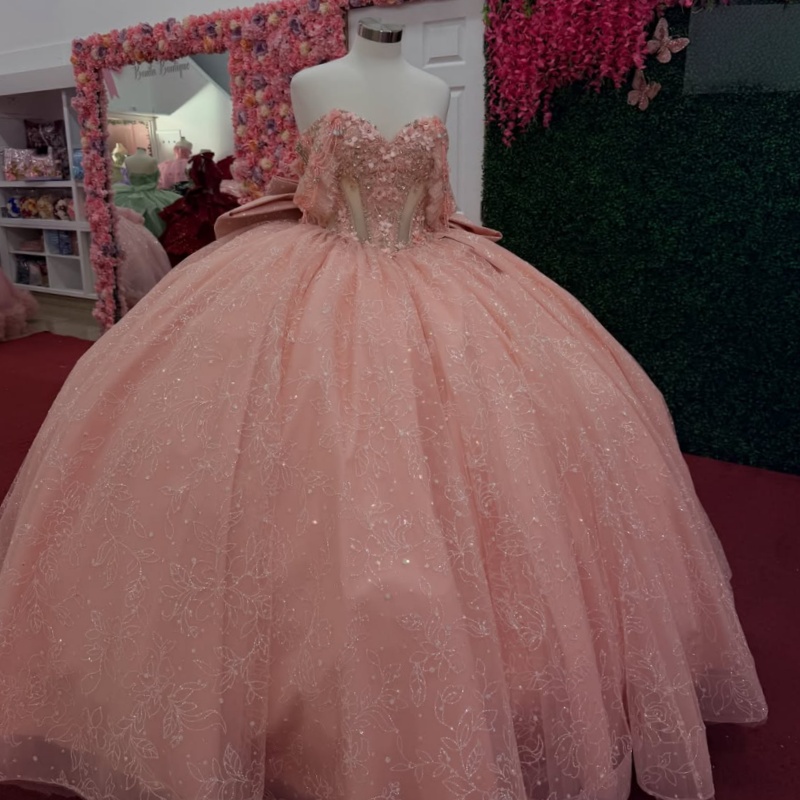 Abiti Quinceanera rosa glitter con spalle scoperte Abito da ballo dolce 16 Abito con paillettes Applique Perline in pizzo Fiocco Tull Festa di compl