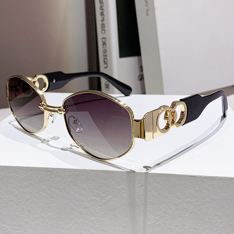 High-End Designer Sunglasses New Metal Women's Oval Personality Trend Driving Sunglasses European And American Small Frame Sunshade Glasses