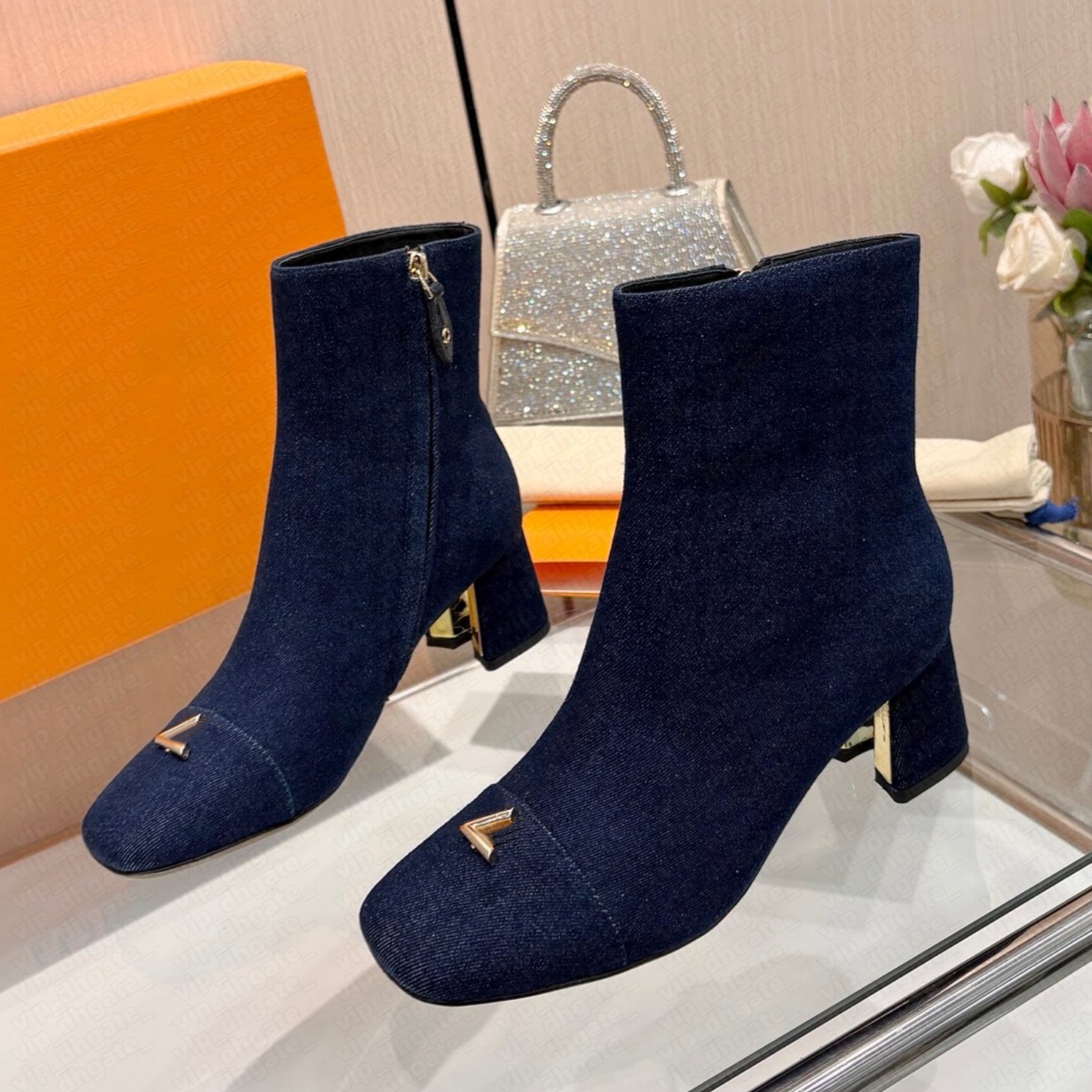 booties woman designer kitten heel point toe ankle strap buckle zipper suede matte luxury comfortable black brown blue white city street modern retr