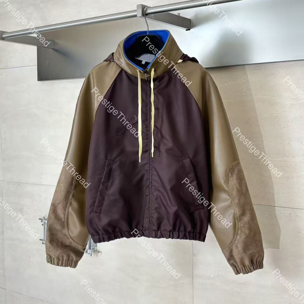 SS Early Spring Series Leather Patchwork Hooded Zipper Jacket Designer Men's Leather & Faux Leather