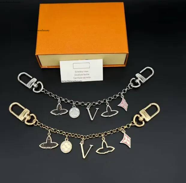 2026 New style Luxury Brands keychains Designer bag metal flower chains key ring Fashion Bags charm Lovers Keychains Car Key Accessories