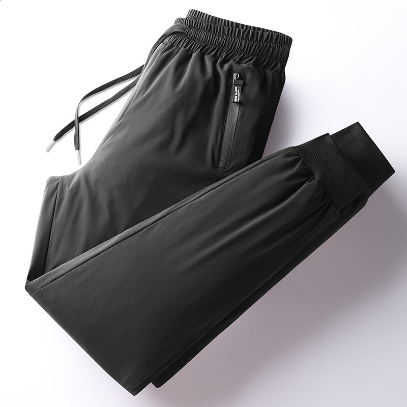 Pantalon en duvet de nouveau style épaissi pour l'hiver chaud coupe-vent en duvet de canard blanc pantalon long à jambe effilée pour hommes adapt