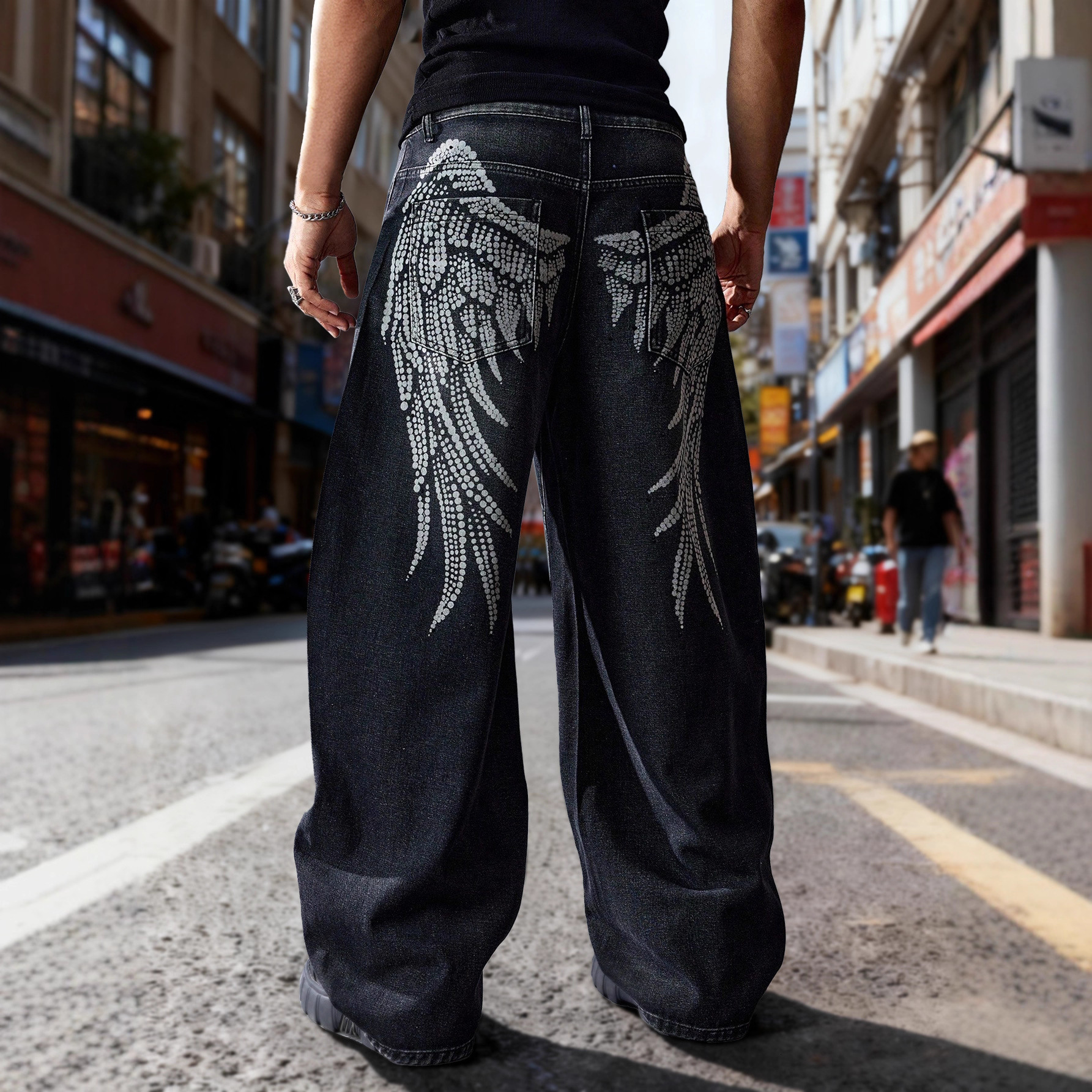 Designer angel wing print straight-leg jeans, black with rhinestone embellishments, men's loose-fit casual long pants, trendy street style