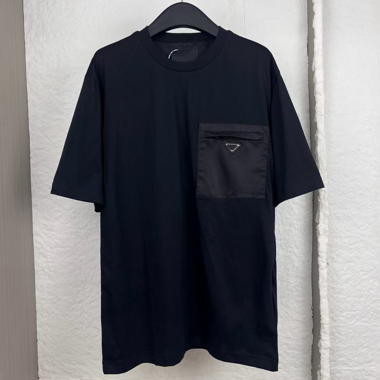 Designer brand men's T-shirt high-quality casual short sleeved top with pocket decoration triangle frame luxurious short sleeved shirt