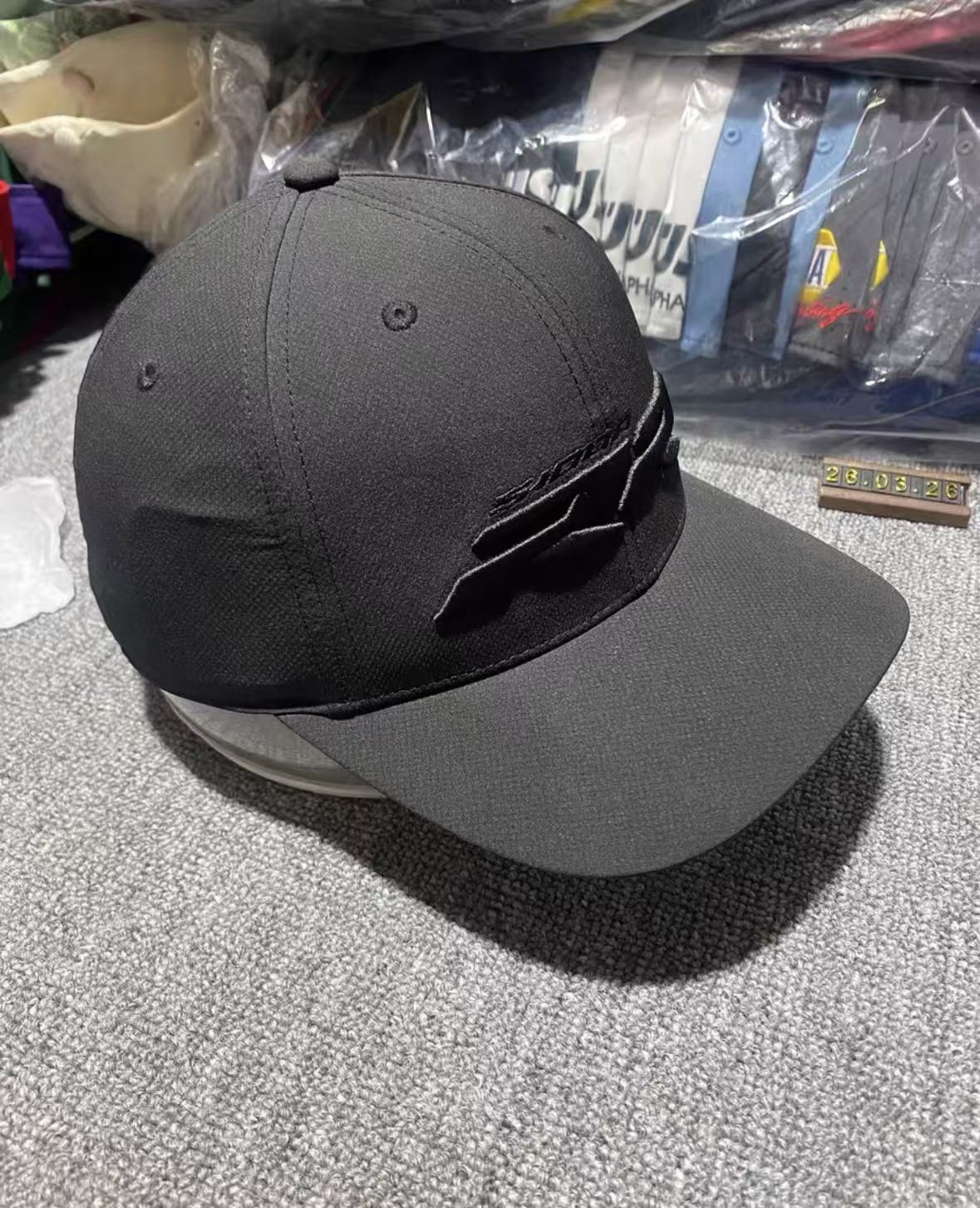 Designer Baseball Cap Racing black hard-top fedora cap with curved brim. The cap body features the S1000RR logo. Adjustable brim circumference