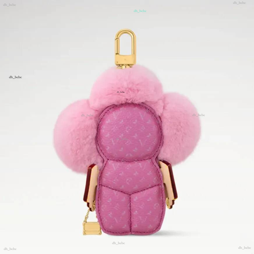 Porte-clés de luxe rose bleu fourrure tournesol designer porte-clés sac charmes pendentif accessoires fleur de soleil poupée voiture porte-clés c