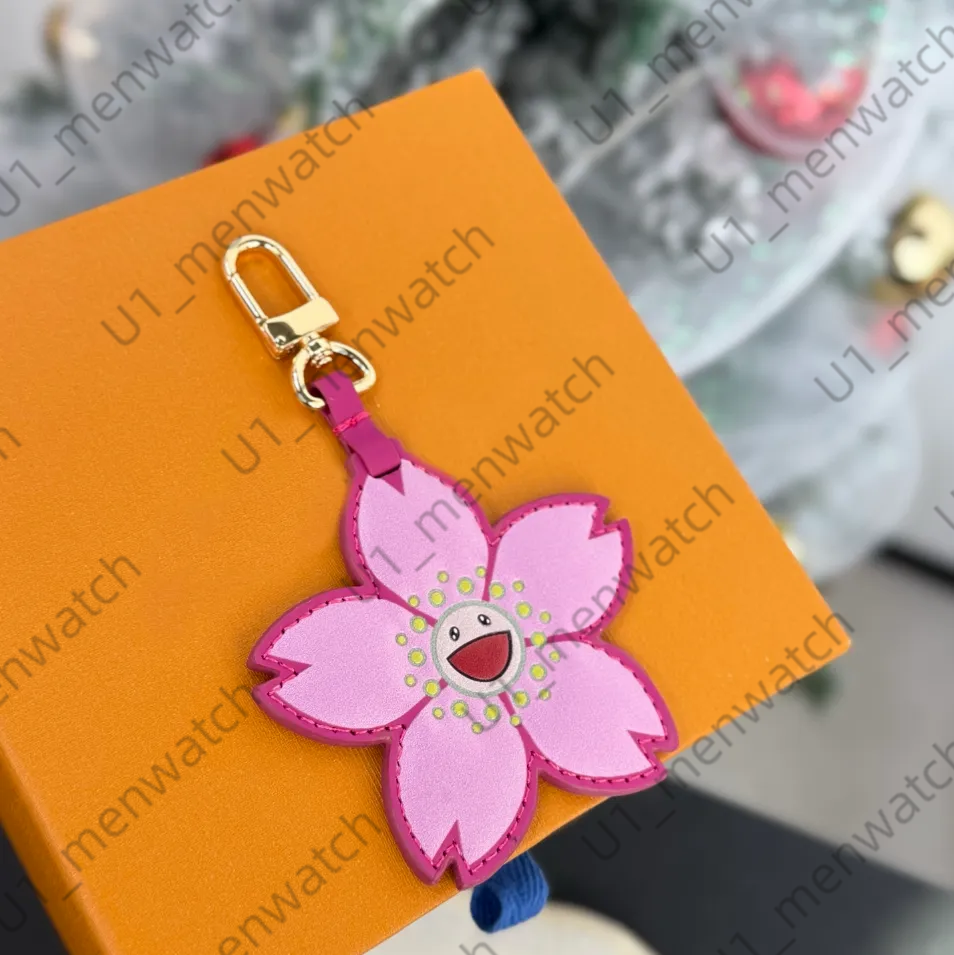 Fashion Dog Cat Bag Charms Designer TM Cherry Blossom Bag Charm Luxury Keychain Personalized Cartoon Pendant Handbag Charm For Women Men Key Chain g