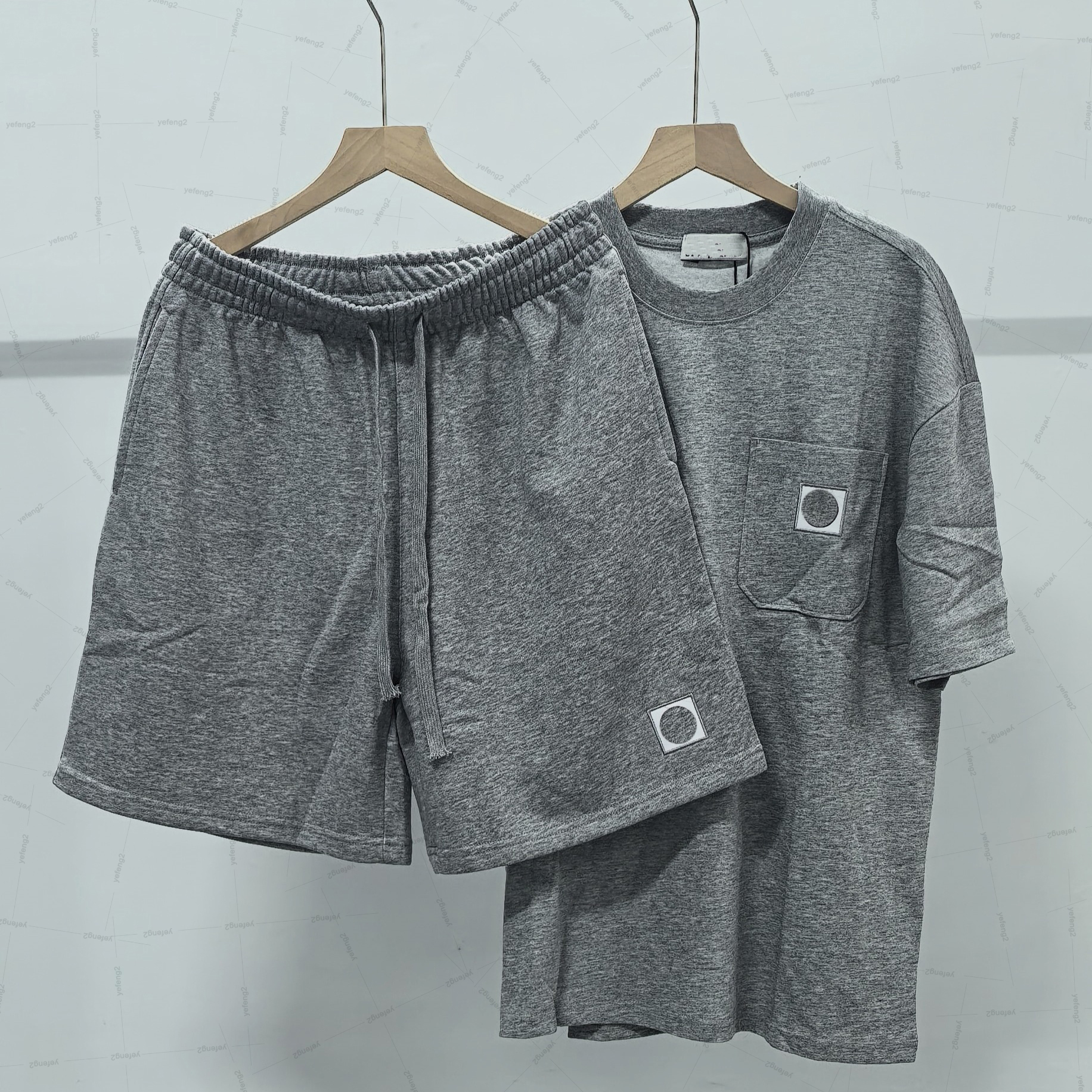 Survêtements pour hommes Islanda ensemble à manches courtes survêtements pour hommes femmes été badge épissé mèche ensemble d'athleisure
