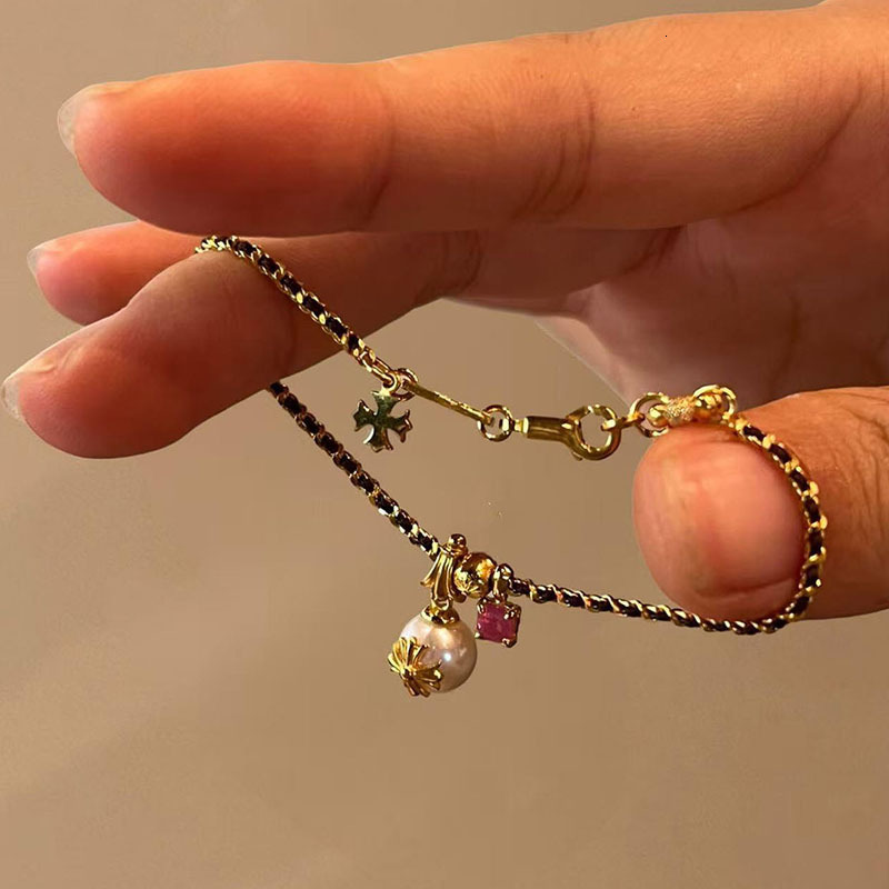 Luxury Brand Designer Jewelry Xiaohongshu Hot-Selling Black Gold Chain Braided Pearl Cross Pendant Bracelet Exquisite Elegant Jewelry One Piece Drop