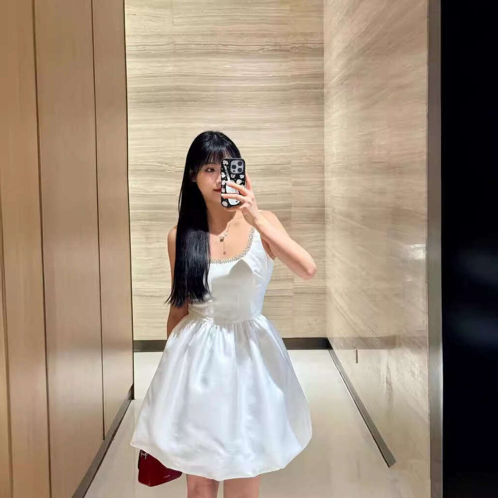 C15 2026 Spring Summer New Niche Design Pure White Diamond Embellished Strap Flower Bud Waist-Cinching Puffy Short Dress