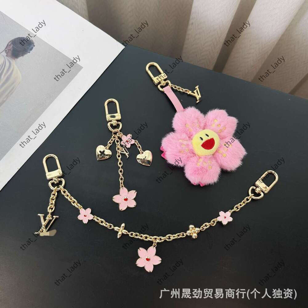 L V Keychain Lo uis Vu itt on Keychain Lujia 25 Sakura Pendant European and American Style Doll Phone Case Decoration Bag Chain Keychain 158