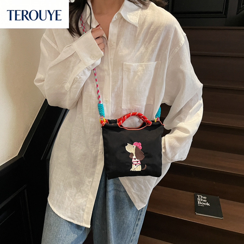 terouyes latest fashion luxury bag this year features a simple and casual style with japanese embroidery and a cute dog design for womens shoulder b