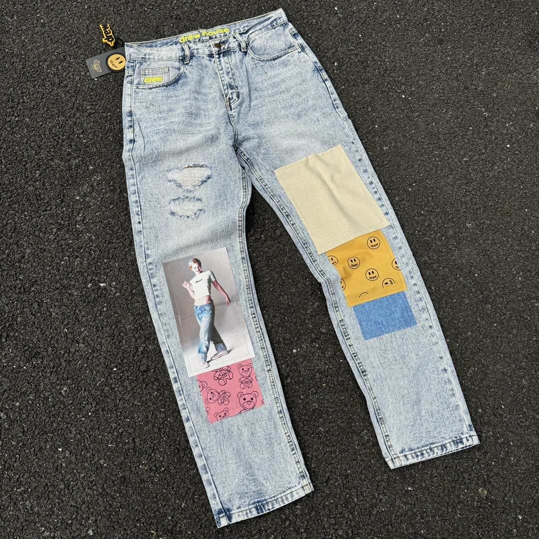 Jeans de créateurs Version haute DREW Smiley Face Full Print Patchwork Jeans déchirés Lâche Style coréen unisexe
