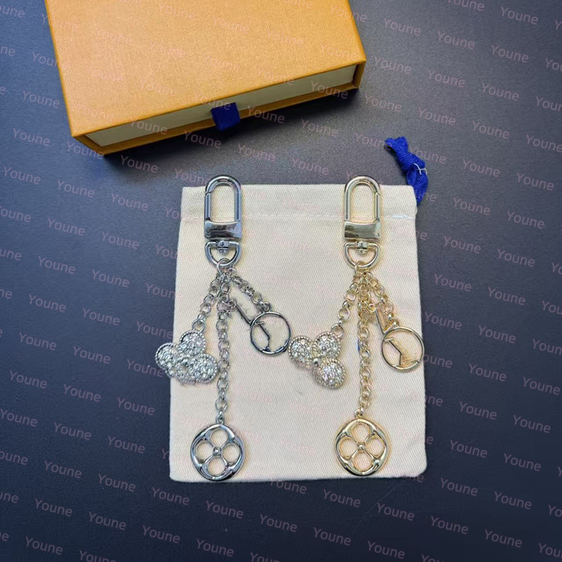 Porte-clés de mode Cercle Charme pour Sac Porte-clés de luxe Micro Charms V Iconic KeyHolder porte-clés avec lettres designer unisexe Porte-monna