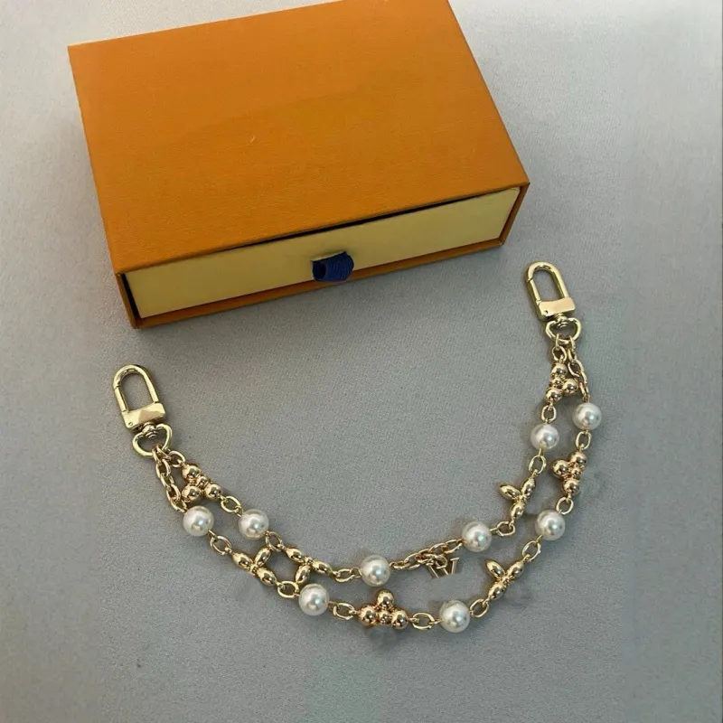 Porte-clés de créateur Chaîne de charme de sac Pendentif coeur Porte-clés Designer Femmes Couleur Or Étoile à cinq branches Porte-clés Blanc Perl