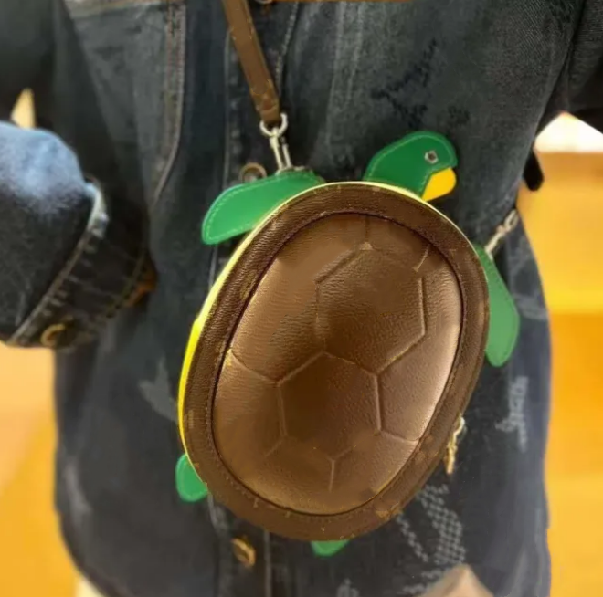 Luxueux Mini sacs en cuir de tortue de mer Porte-clés pochette sac de créateur Mans Womans Sacs à main de style français Sacs à dos pour le charm