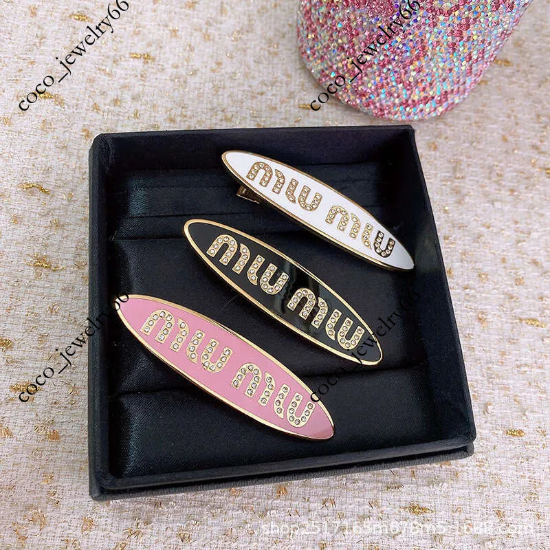 Miu letter side light luxury rhinestone hairpin back of the head high end simple and elegant duckbill clip for women L260311