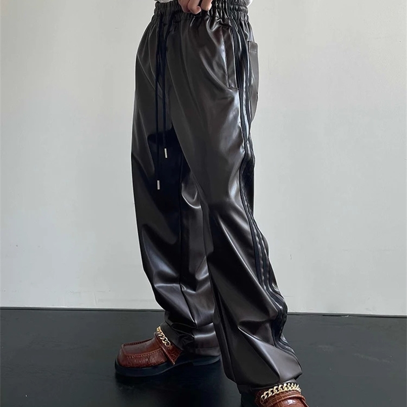Mauroicardi Spring Autumn Cool Black Soft Stretchy Waterproof Pu Leather Pants for Men with Elastic Waist Loose Casual Clothes 260516BJ