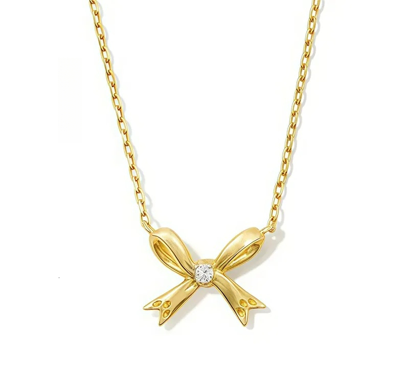 2024 Pendentif Kendric Scott Bow Designer Bijoux Collier de luxe Diamant Chaîne en métal Plaqué Or Colliers Casual Populaire ZL100