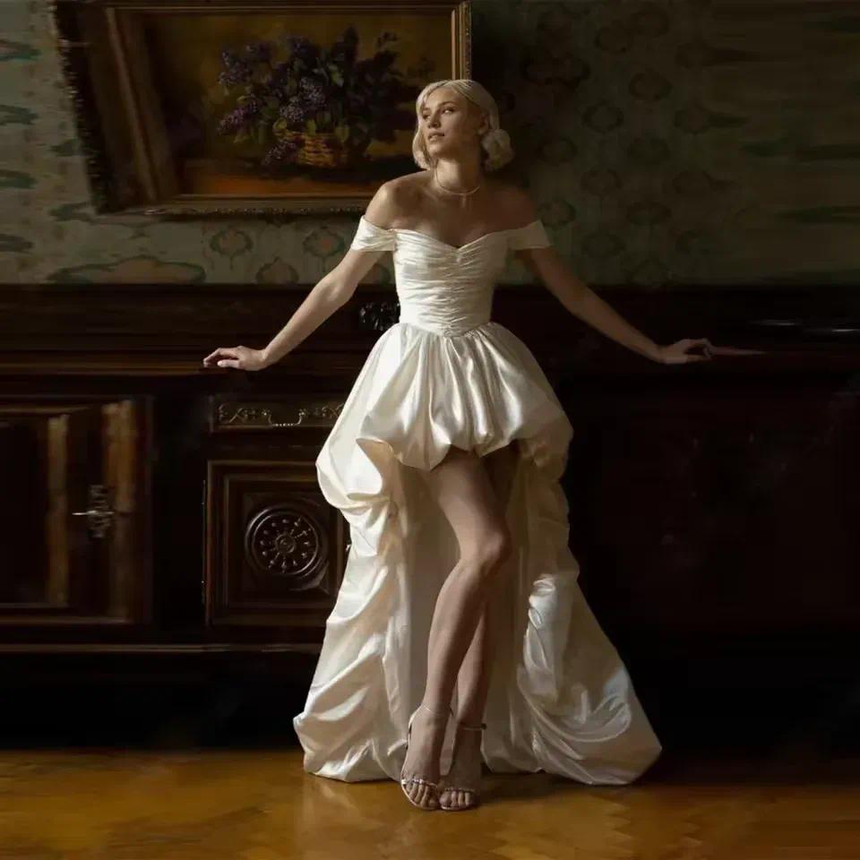 Off the Shoulder Sweetheart Ruched Bodice Glossy Satin High Low Wedding Dress Short Front Long Back Train Puffy Bubble Skirt Modern Romantic Formal
