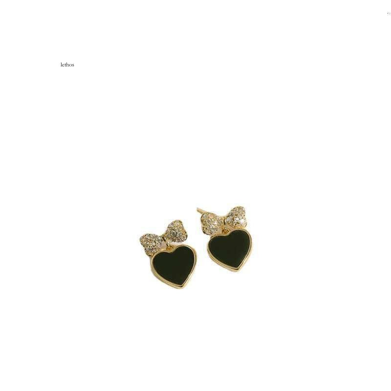 New 925 silver needle black heart for women, sweet and cool heart-shaped bow studs, niche design, minimalist style earrings