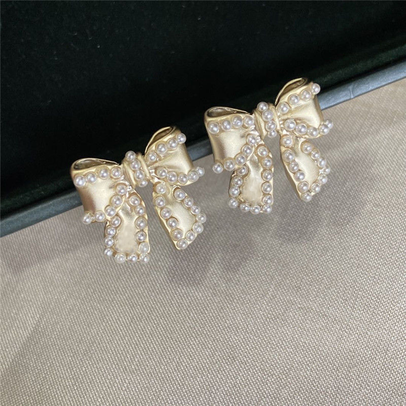 Matte Gold Bow from Dongdaemun, Korea gold Sweet Elegant Earrings Versatile and Trendy with a High-End Feel