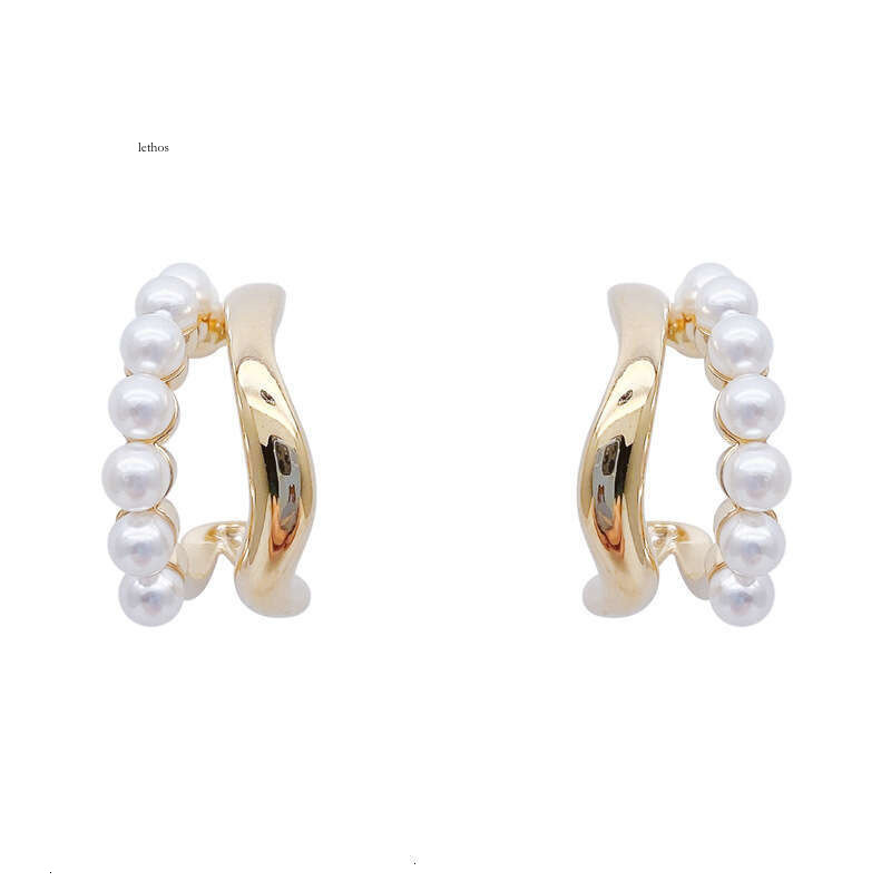 S925 silver needle niche design twisted wave pearl earrings, Korean style, simple and versatile, elegant stud earrings