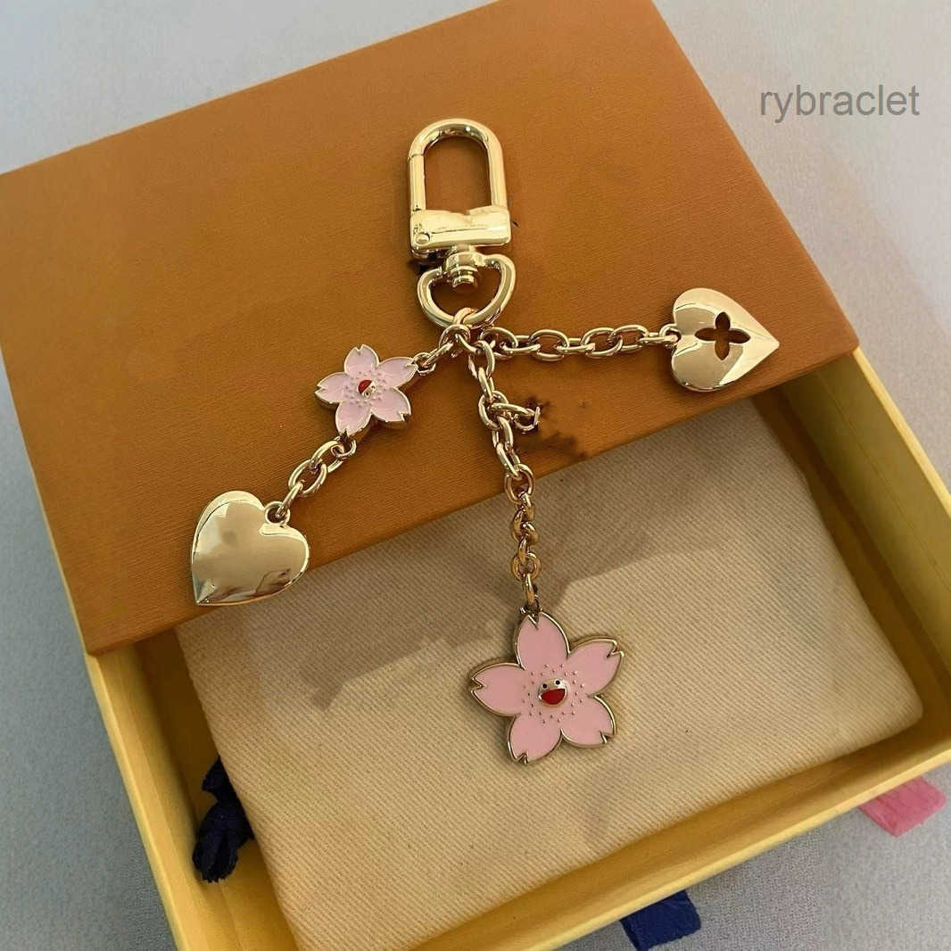 Designer Keychains Luxury metal bag charm chain flower heart designer bag charms gold sliver keychain Snap fastener mens ladies keychain Holiday gif