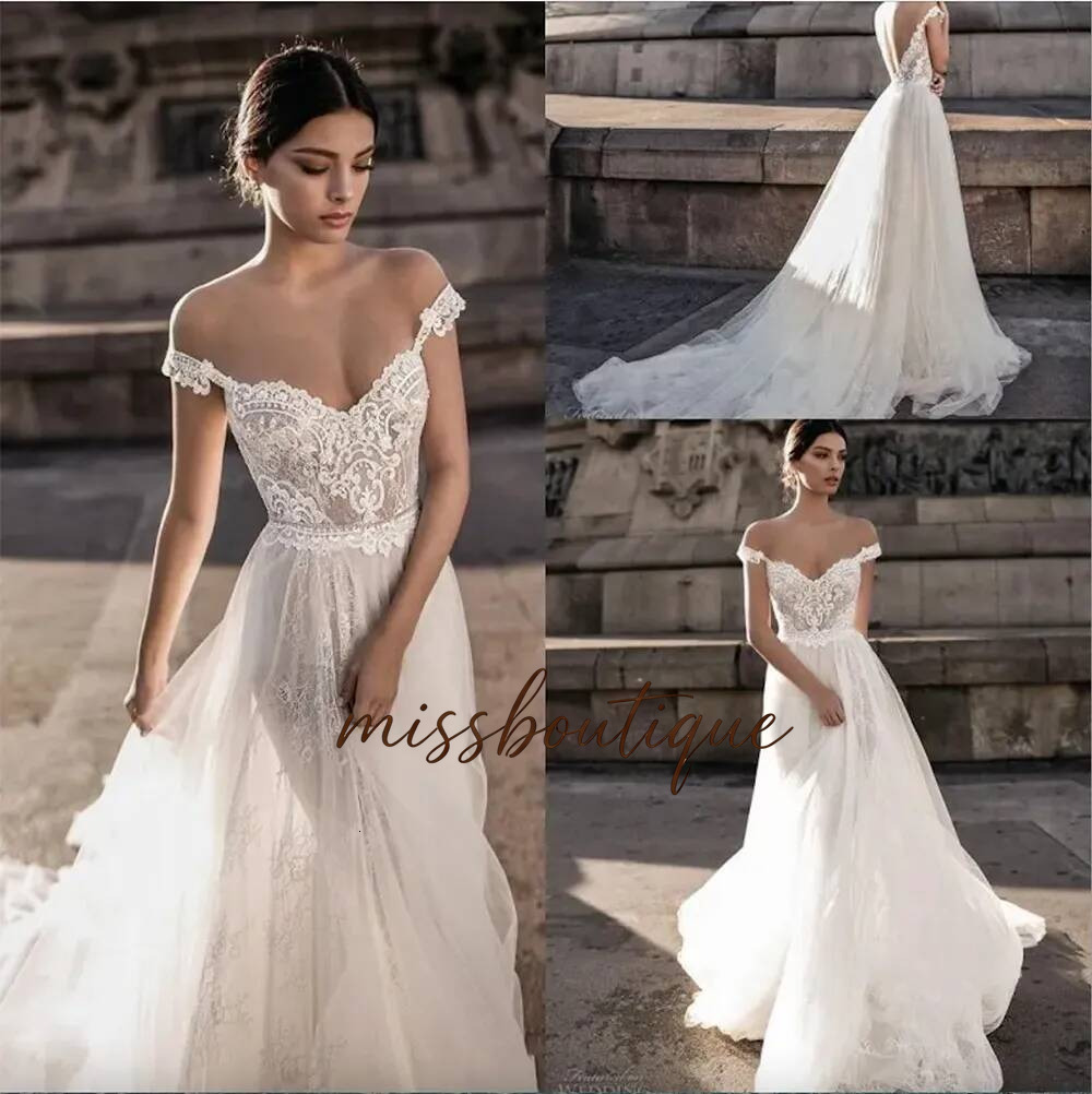 A Line Wedding Sheer Bohemian Dresses 2023 Off Shoulder Lace Applique Romantic Tulle Court Train Backless Bridal Gowns Custom Boho Q84