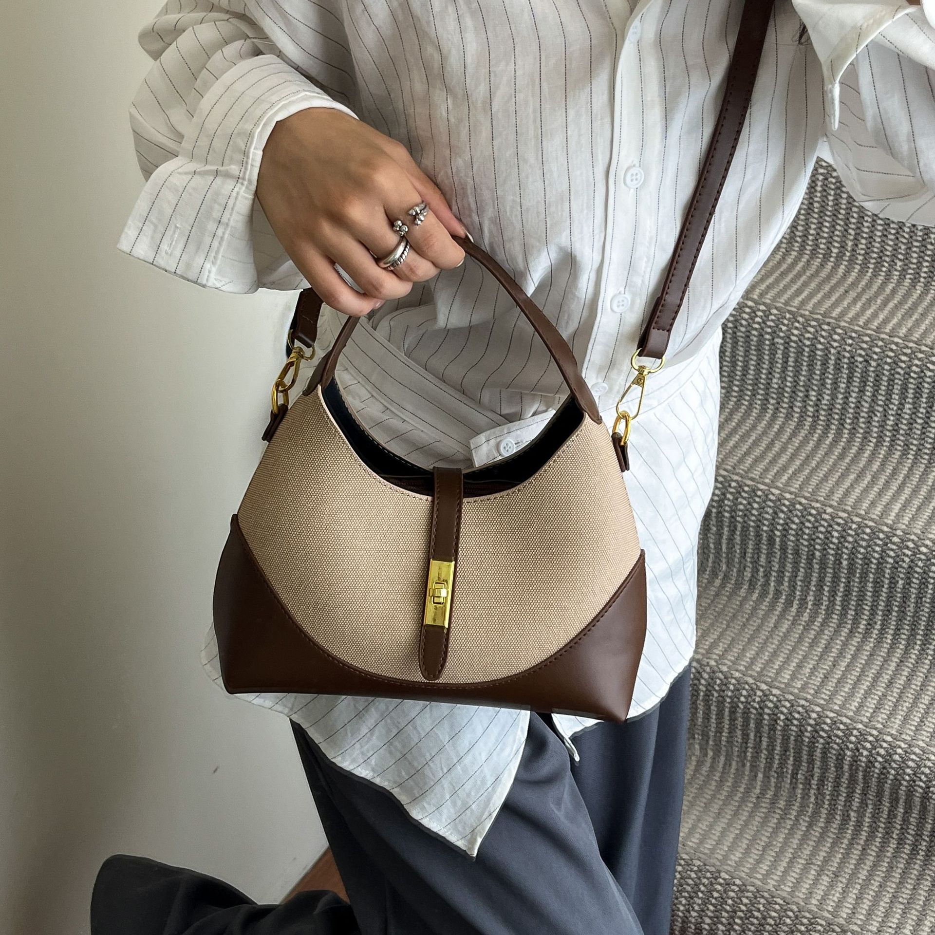Best seller High-end, contrasting color, niche design women's 2026 new model dumpling versatile for commuting, can be used as a handbag, crossb