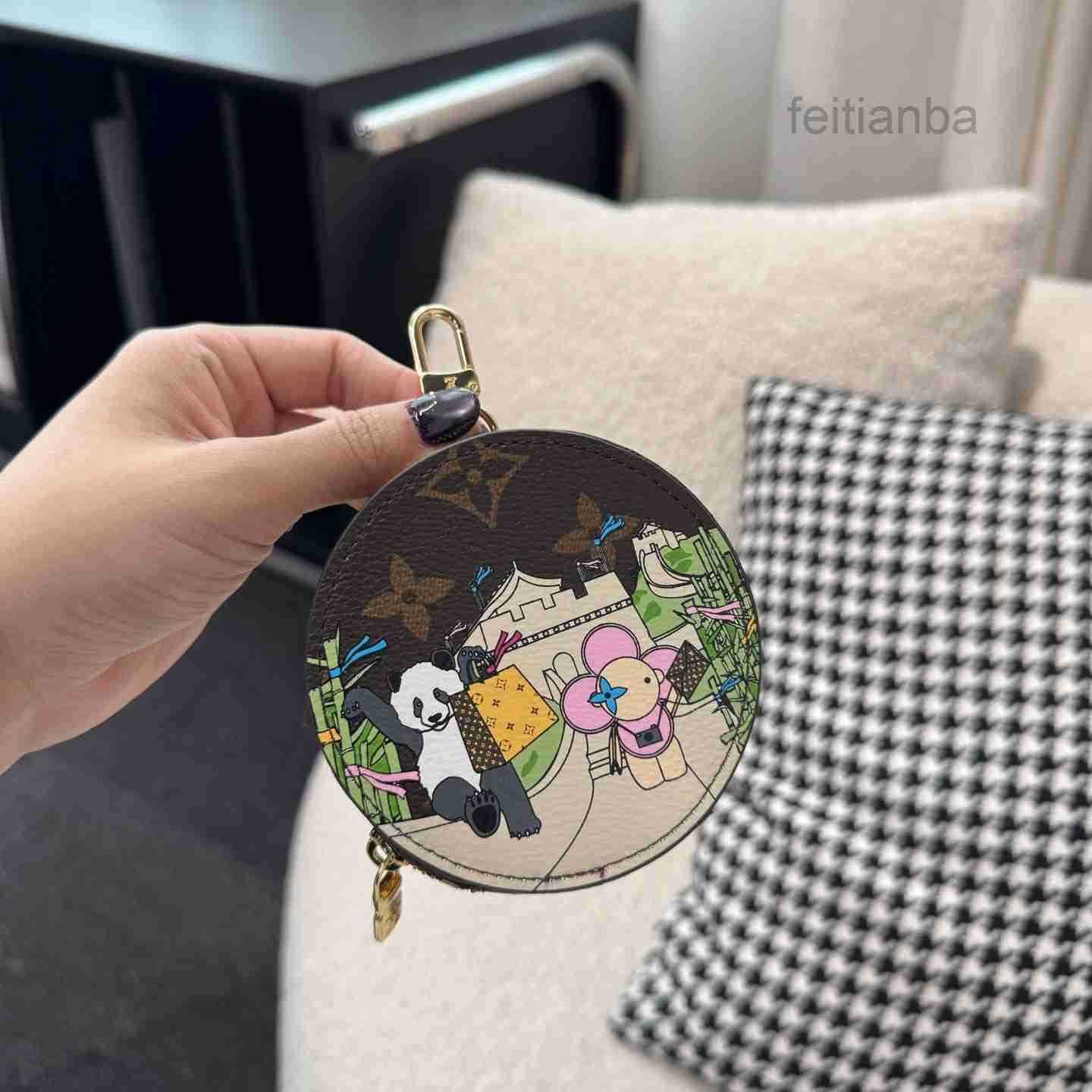Keychains Designer Luxury Brand Sunflower Round Coin Purses Letter Printing Unisex Mens and Womens Mini Clutch Bags Classic Famous Designer Zipper L
