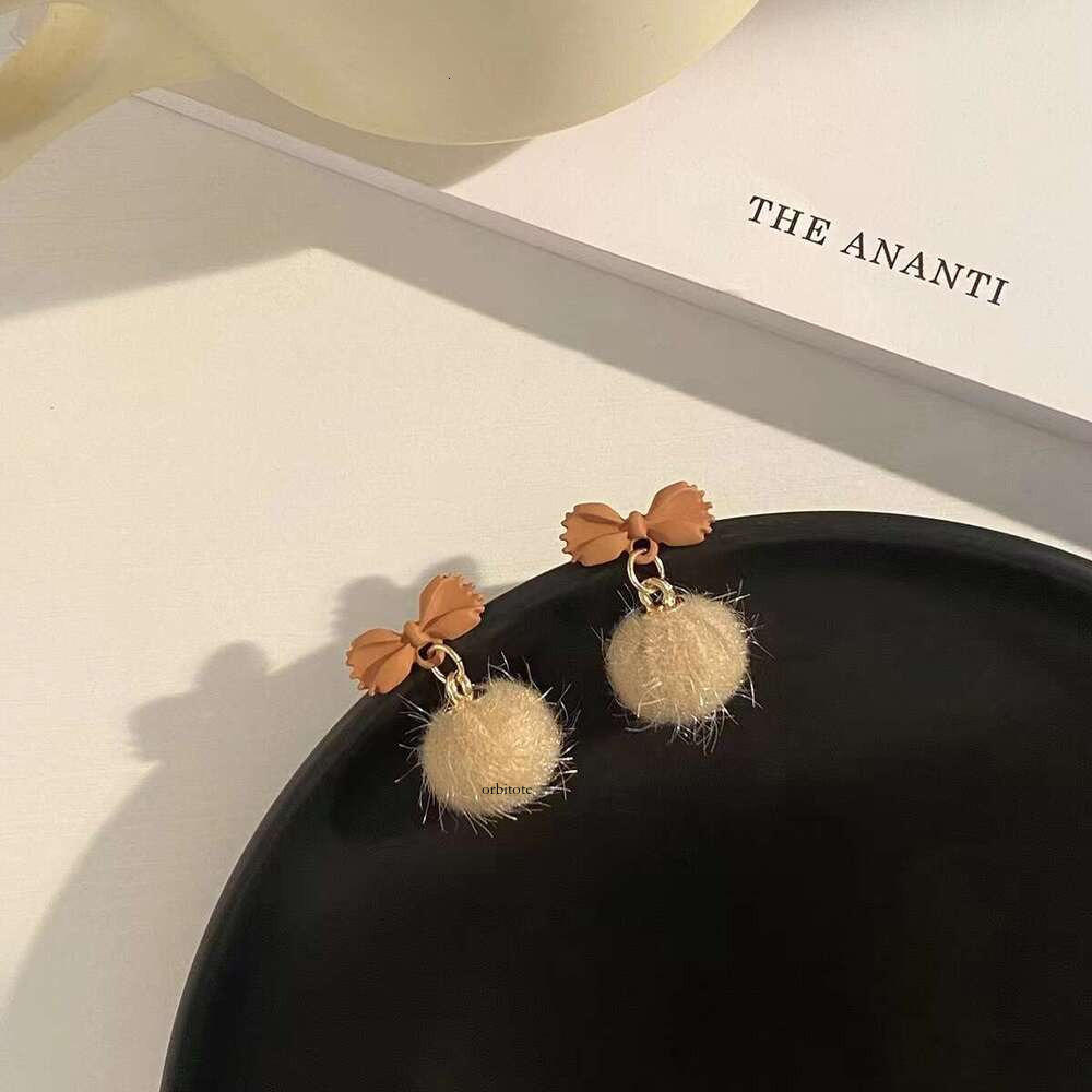 Bowknot Mink Fur Ball for Women 2025 New Trendy Autumn-Winter Plush Design Earrings with a High-End Elegant Look
