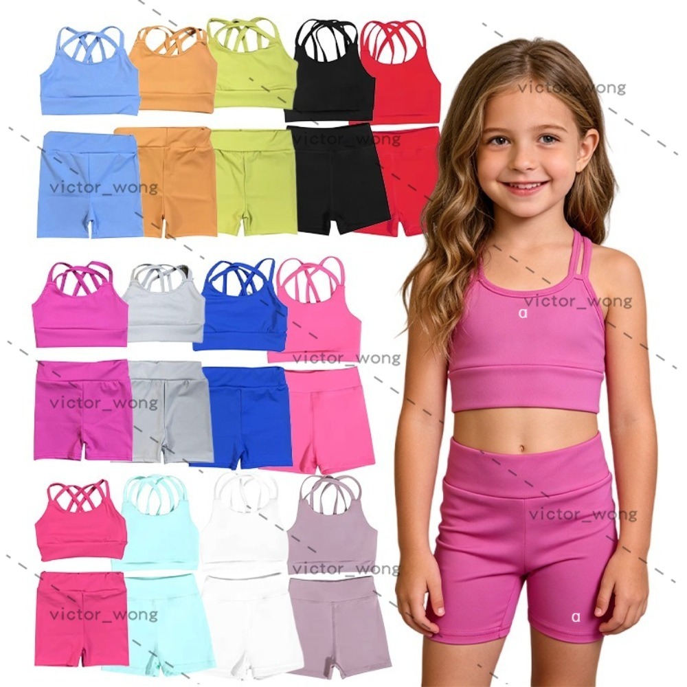 Yj-110 Girls 2 Piece Sports Outfit Spaghetti Strap Kids Outfit Yoga Crop Tank Top High Waist Biker Shorts Set