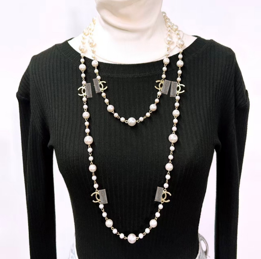Luxury Long Pearl Chain Necklace for Women Elegant Multi-Strand Faux Pearl Statement Necklace with Gold Tone Charms, Perfect for Party, Wedding, and
