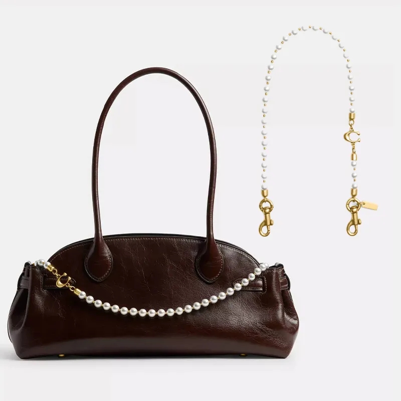Porte-clés de marque de styliste pour femmes, pendentif de sac, adoption d'une nouvelle chaîne de sac, bijoux suspendus, Texture métallique rétro