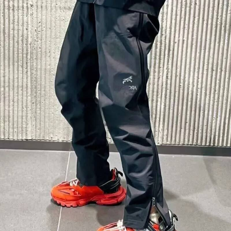 2026 10A Hot Sales Waterproof Arc Pants Ski Trousers Arktery Windbreak Hard Shell Full Zipper Sweatpants Outdoor Skiwear Goretex Waterproof Artery P