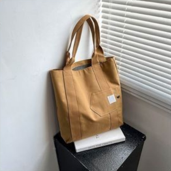 Sac de designer 2026 Sac femme Sac fourre-tout de mode japonaise et coréenne Sac à main de travail Sac à main Annexe Magazine Sac Casual Tendance
