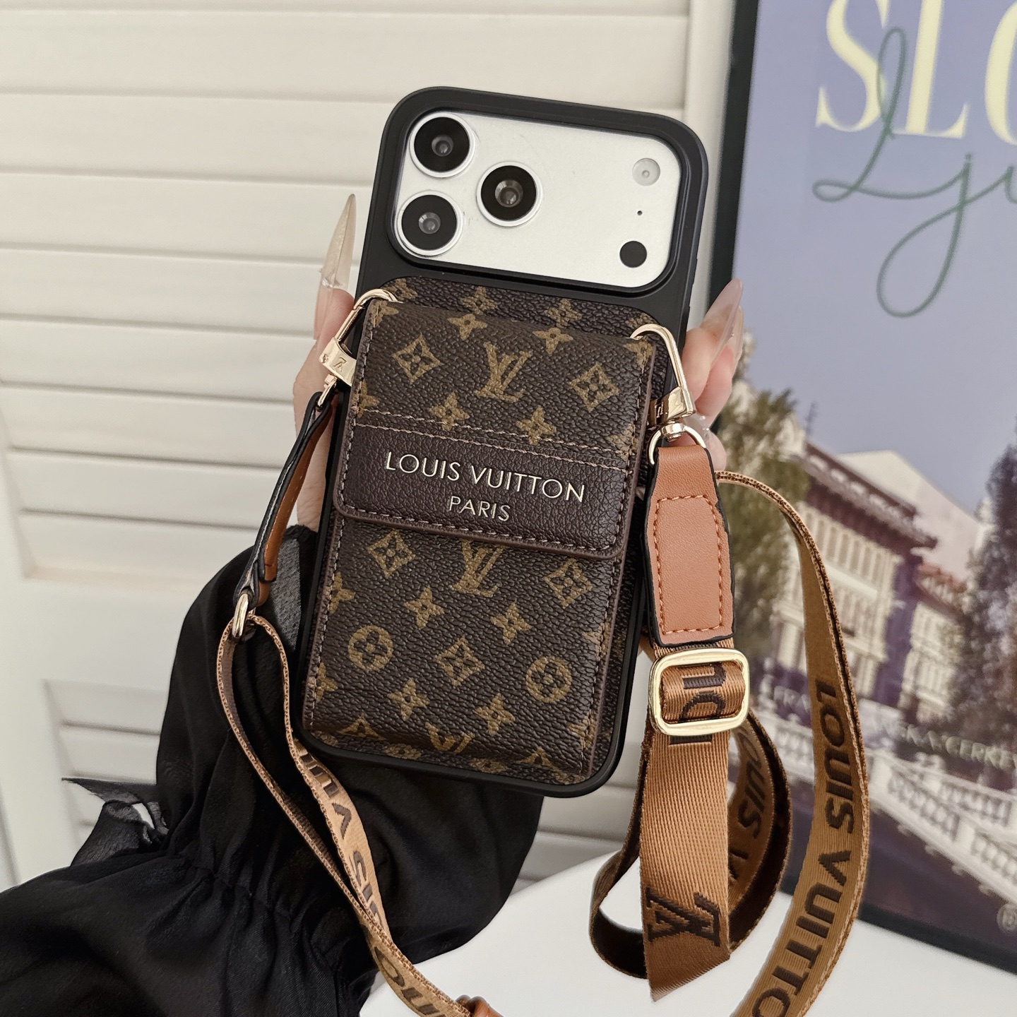The designer of the fashionable mobile phone case applies to the 18 pro max 17 16 15 14 13 lens film leather full package light luxury model