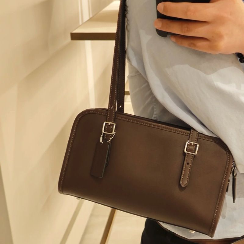 Livraison gratuite designer automne et hiver nouvelle niche haut de gamme sac sous les bras boucle ardillon sac à main sac à bandoulière Swing Zi