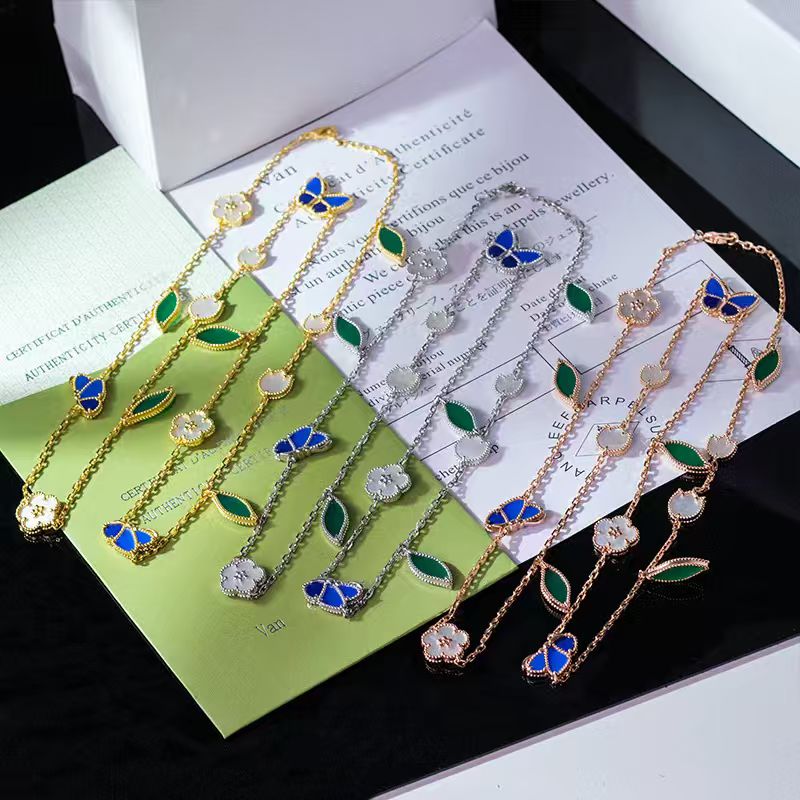 Collier pull en fleur de prunier papillon à quatre feuilles, collier de créateur de bijoux en acier inoxydable pour femmes en or 18 carats