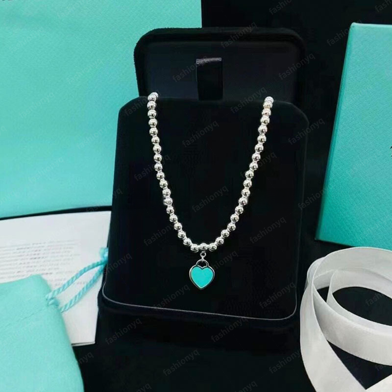 Bijoux de luxe en forme de coeur émail croix chaîne collier de créateur pour les femmes coeur de pêche perle ronde bouddha collier de perles mode