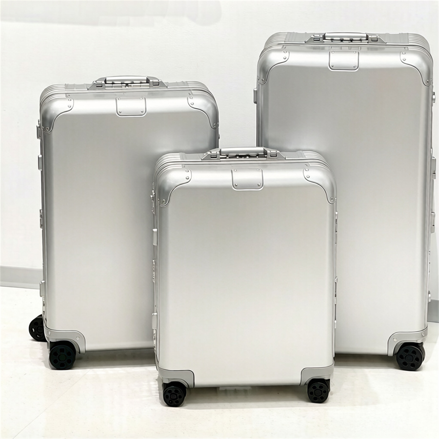 Valise de créateur d'embarquement unisexe, valise à roulettes, boîtes en alliage d'aluminium, poignée en cuir véritable, valise de voyage, grande