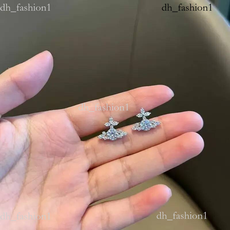 2026 Luxury Brand Designer Vivine West Wood Jewelry New Full Diamond Cross Flower Zircon Saturn Earrings Ring For Women Light Luxury Elegant High En