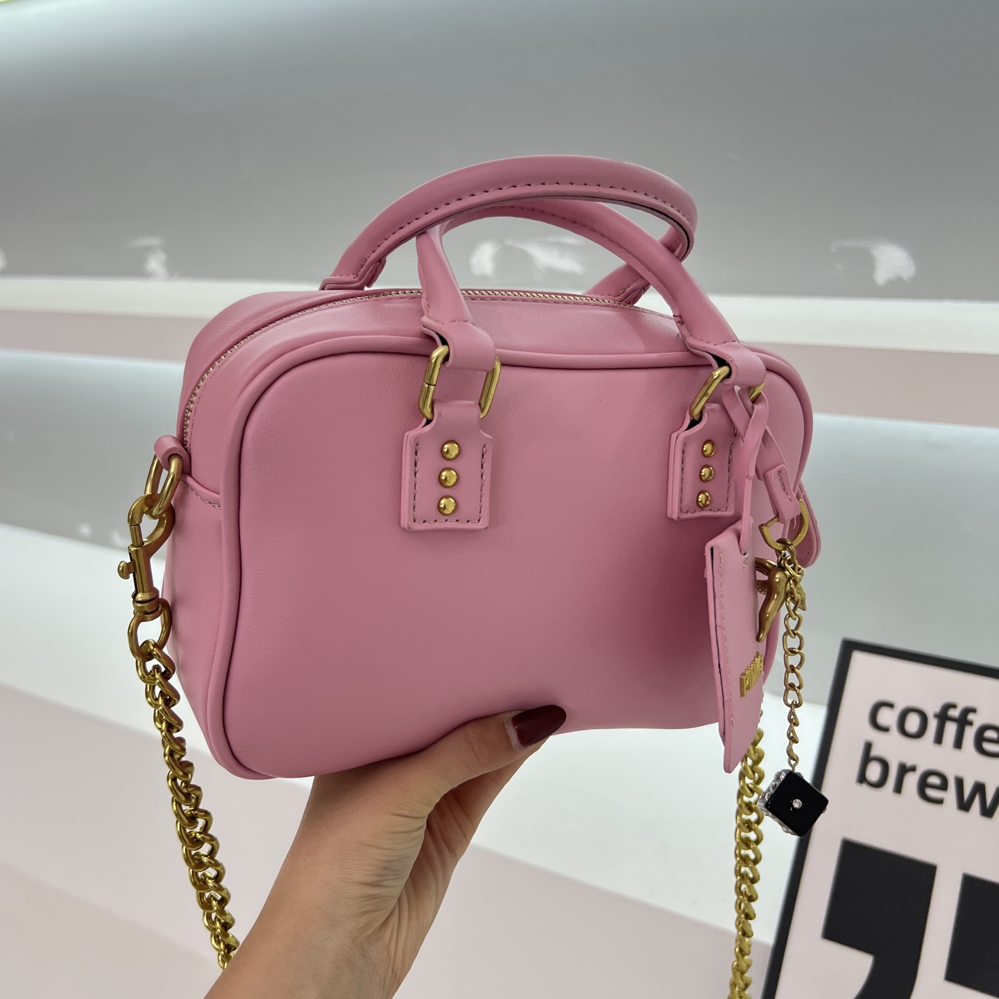 Sac de designer Sacs de luxe Pinkoos Sac Puff Mini Bowling Satchel Cuir Boston Duffle Sac Vente Chaude Dés Charme Chaîne Femmes Poignée Bandouliè