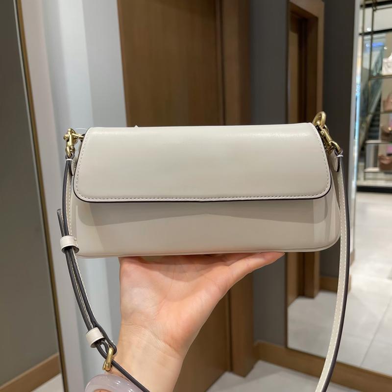 Sac à rabat de marque de luxe 2025 nouvelle mode femmes baguette sacs top texture sac à main fossette en cuir souple épaule unique sac à bandouli
