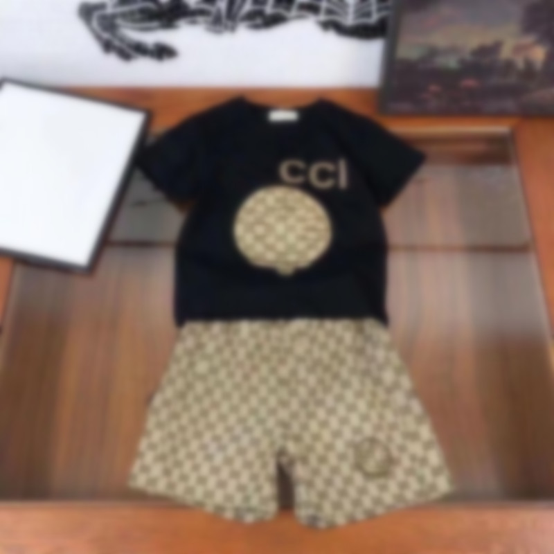 Vêtements d'été 100% coton imprimés de dessins animés pour enfants, t-shirt et Short noirs, ensemble de loisirs à manches courtes pour garçons et