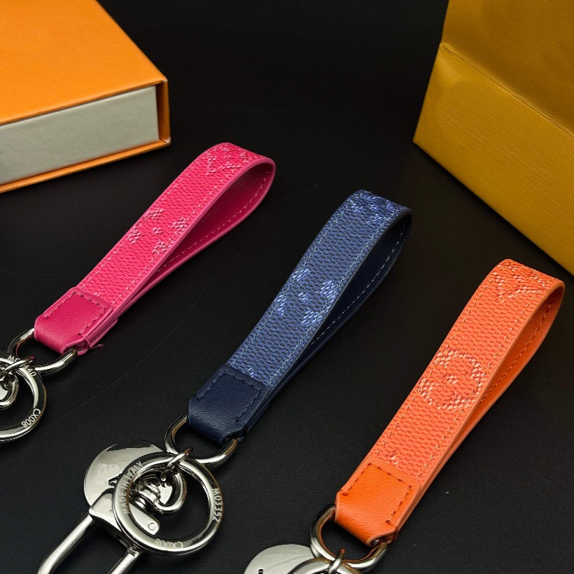 New Orange Faux Leather Strap Keychain With V Detail Metal Charm Stylish Bag Accessory And Ideal Gift For Fashion Lovers