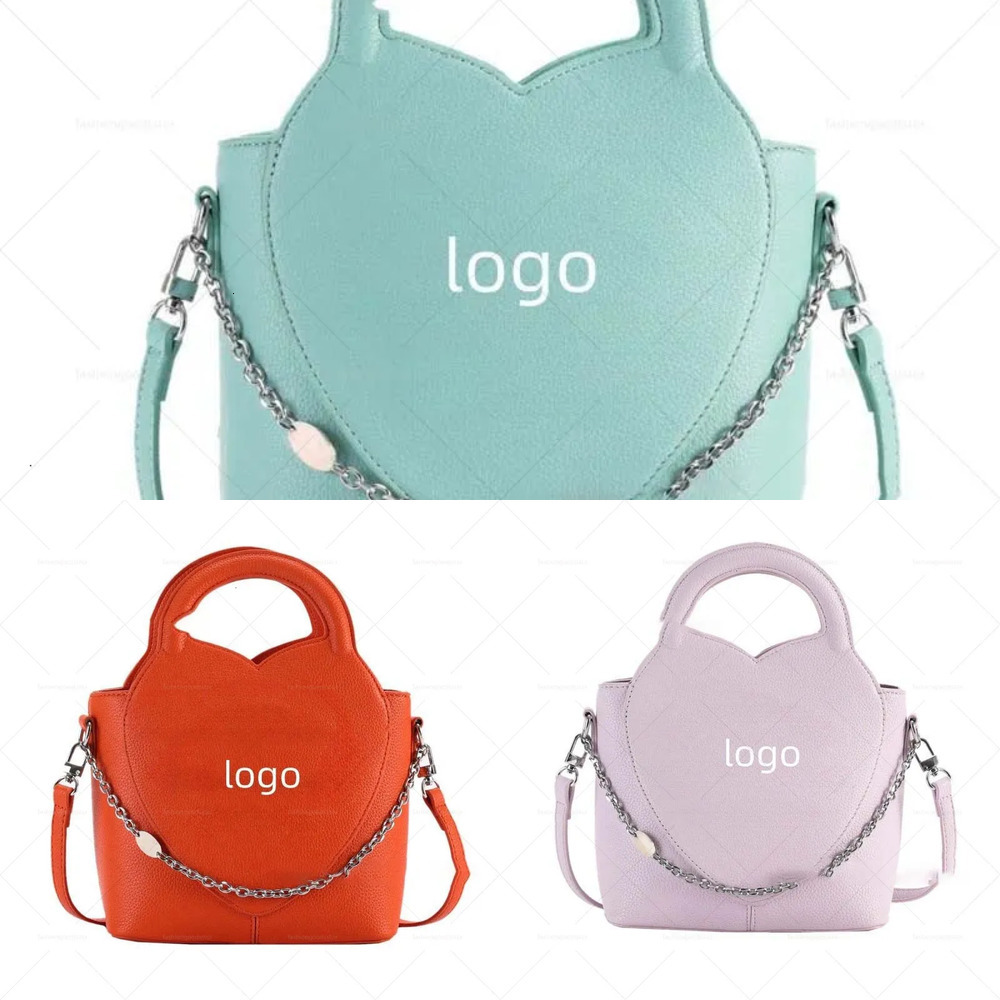 Top Designer Sac Sac De Luxe Nouvelle Mode Alliage Électrolytique Simple Coeur Pêche Gravé Lettre Anglaise Pendentif Bijoux Accessoires Sac À Mai